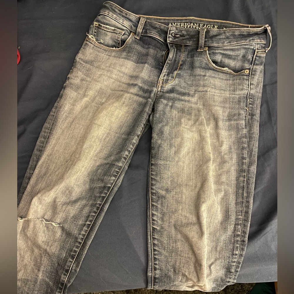 Medium wash American Eagle x-long skinny jeans